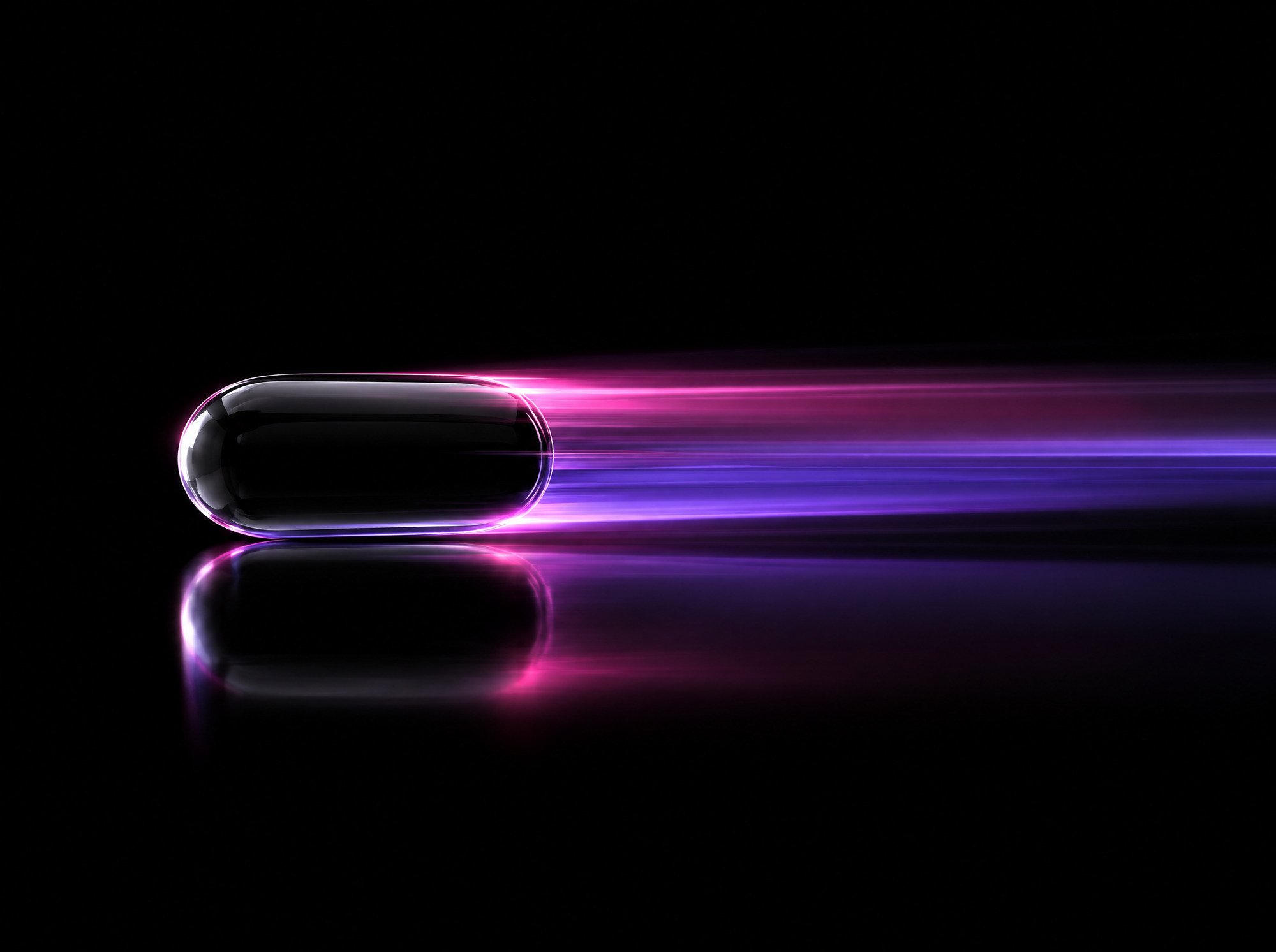 A black glass capsule leaving pink and violet light trails at speed